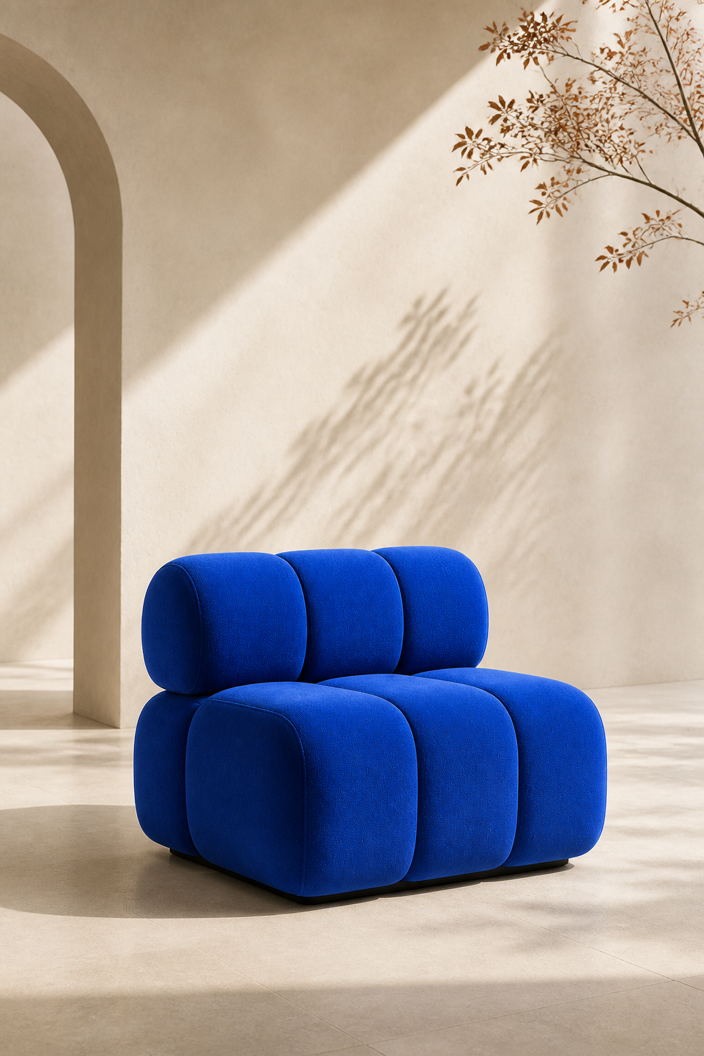 Cobalt blue chair in a soft architectural setting
